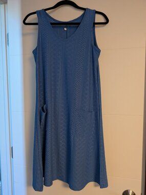 Blue sleeveless summer dress with pockets.